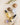 Non-toxic face oils and balm with shells and moss on marble