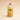 Amber glass 32 oz refill bottle with a black screw cap, front label reading refill