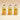 Three amber glass refill bottles with black caps, labeled refill, on a sand background